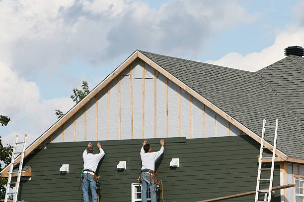 Professional Storm Damage Siding Repair technician working in Clarksburg, PA